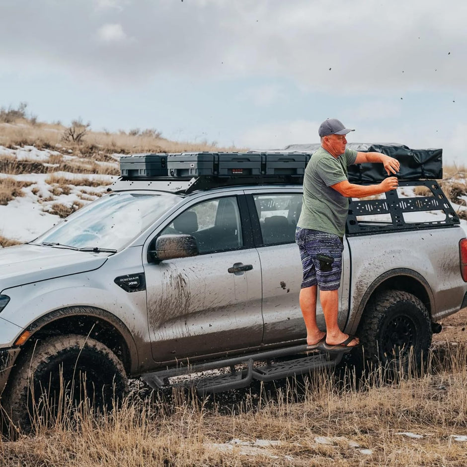 Binary Star's innovative Three-Step Design featuring a higher step near the truck's rear for easy access to roof or bed cargo, eliminating the need to climb inside. Two 6