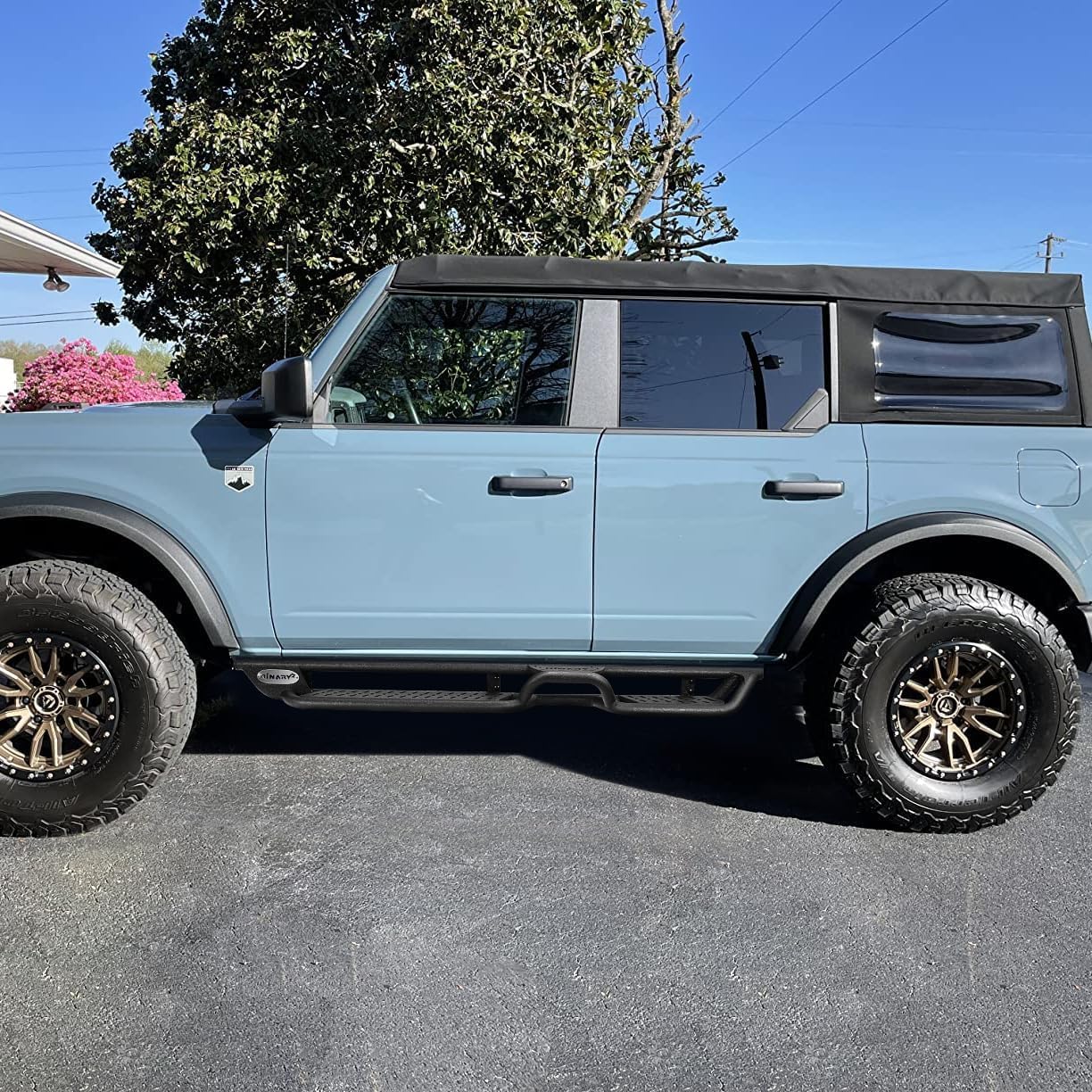 Binary Star's innovative Three-Step Design featuring a higher step in the middle of the running borad for easy access to items on the roof. Two 6